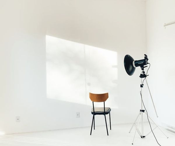 Bright and clean studio space with minimalist design for exercise.